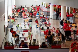 Students dining in the food court area of the Student Union.